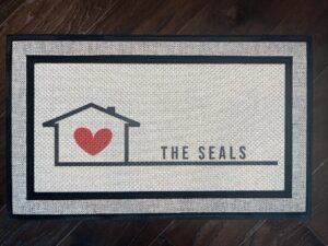 Picture of a finished doormat - Home is Where the Heart is doormat made for The Seals