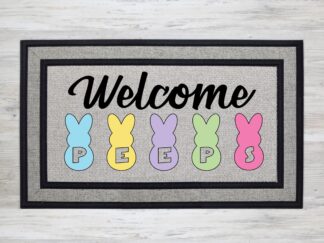 Mockup of an easter themed doormat that features the phrase "Welcome Peeps" with several pastel colored bunny rabbits with the word 'peeps' cut out of the rabbits