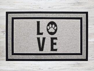 Mockup of a doormat inspired by pet lovers featuring the phrase, "LOVE" in a bold black font with a paw print in the center of the letter 'O'