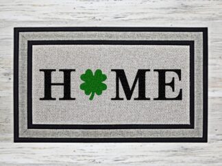 Welcome doormat with shamrock replacing the letter O