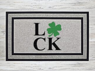 LUCK doormat with shamrock replacing the letter U