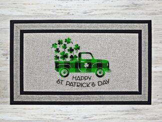 St. Patrick’s Day doormat with green plaid farm truck and shamrocks