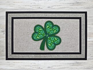 Mandala shamrock doormat with green Celtic-inspired design