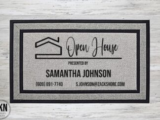 Mockup of a real estate agent themed doormat that has the agent's name and information for the Open House on the doormat, with a cute house drawn up top