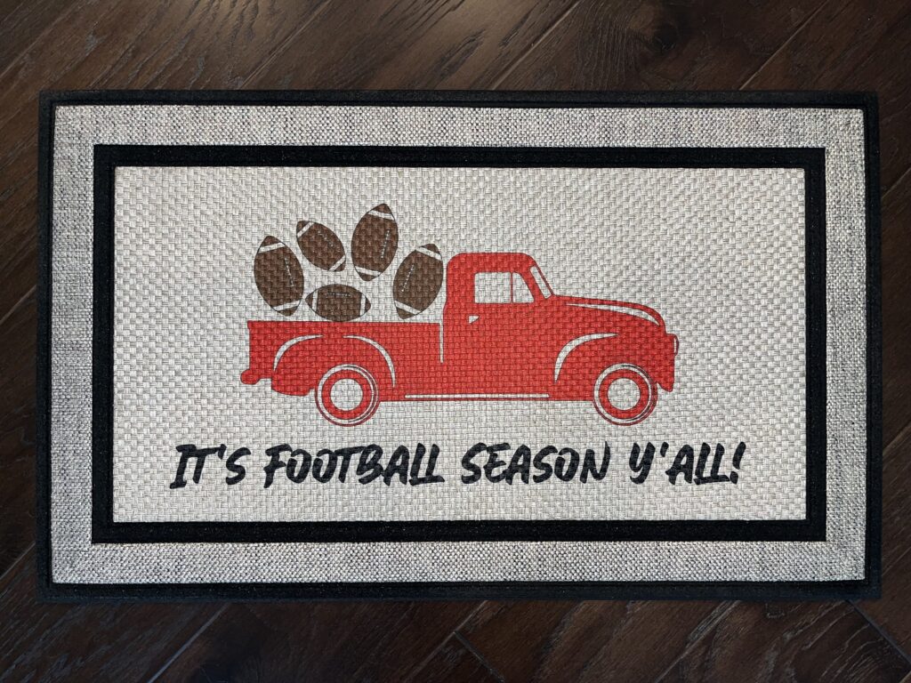 Photo of our 'It's Football Season Y'all' doormat
