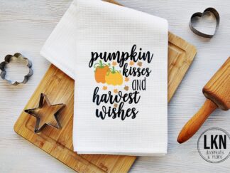 Fall dish towel with pumpkins and phrase Pumpkin Kisses and Harvest Wishes