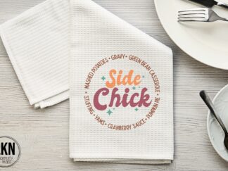 Thanksgiving dish towel with phrase Side Chick and list of holiday side dishes