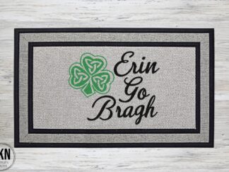 Mockup of a saint patrick's day themed doormat featuring the traditional Irish saying, "Erin Go Braugh" (Ireland Forever) with a Celtic shamrock