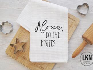 White dish towel with black text 'Alexa, Do the dishes.'