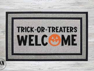 Mockup of a Halloween themed doormat that says "Trick or Treaters Welcome".