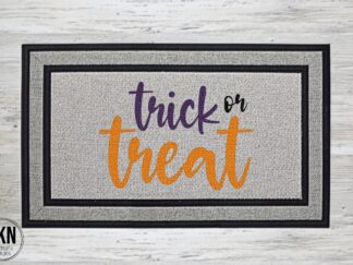 Mockup of a Halloween themed doormat that says "Trick or Treat".