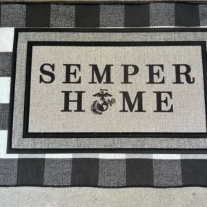 Picture of custom doormat sent in a review by a client - the doormat reads "Semper Home" with the US Marines logo in place of the O in home.
