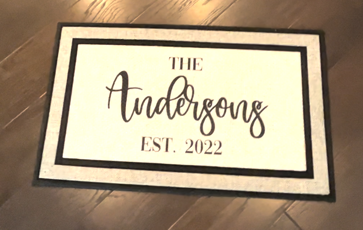 Photo of a custom family name doormat for a client to gift to the Andersons