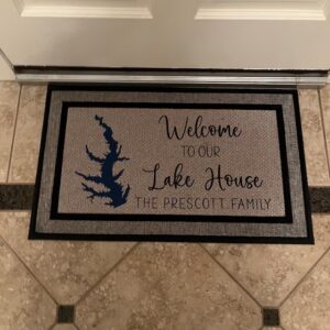 Client photo of custom lake house doormat for the Prescott family