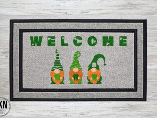 Mockup of a St. Patrick's Day themed welcome mat featuring the phrase "welcome" with three gnomes underneath adorned in traditional Irish colors