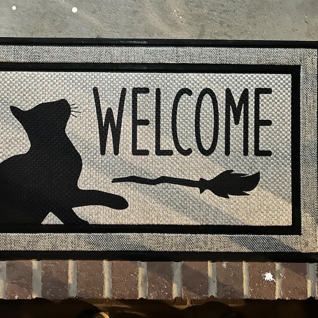 Customer photo of our Black Cat Welcome doormat for Halloween
