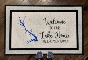 Client photo of our large doormat (30" x 47") with a custom lake design for their home at Lake Strom Thurmond