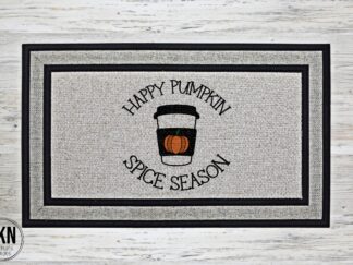Mockup of a Fall themed doormat featuring a cute coffee cup with a pumpkin on it nestled in the phrase Happy Pumpkin Spice Season