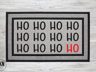 Mockup of a Christmas themed doormat that says Ho Ho Ho