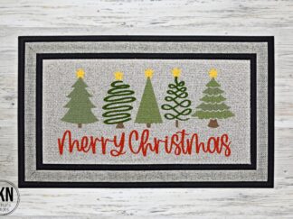 Mockup of Christmas themed doormat that reads Merry Christmas with several Christmas trees
