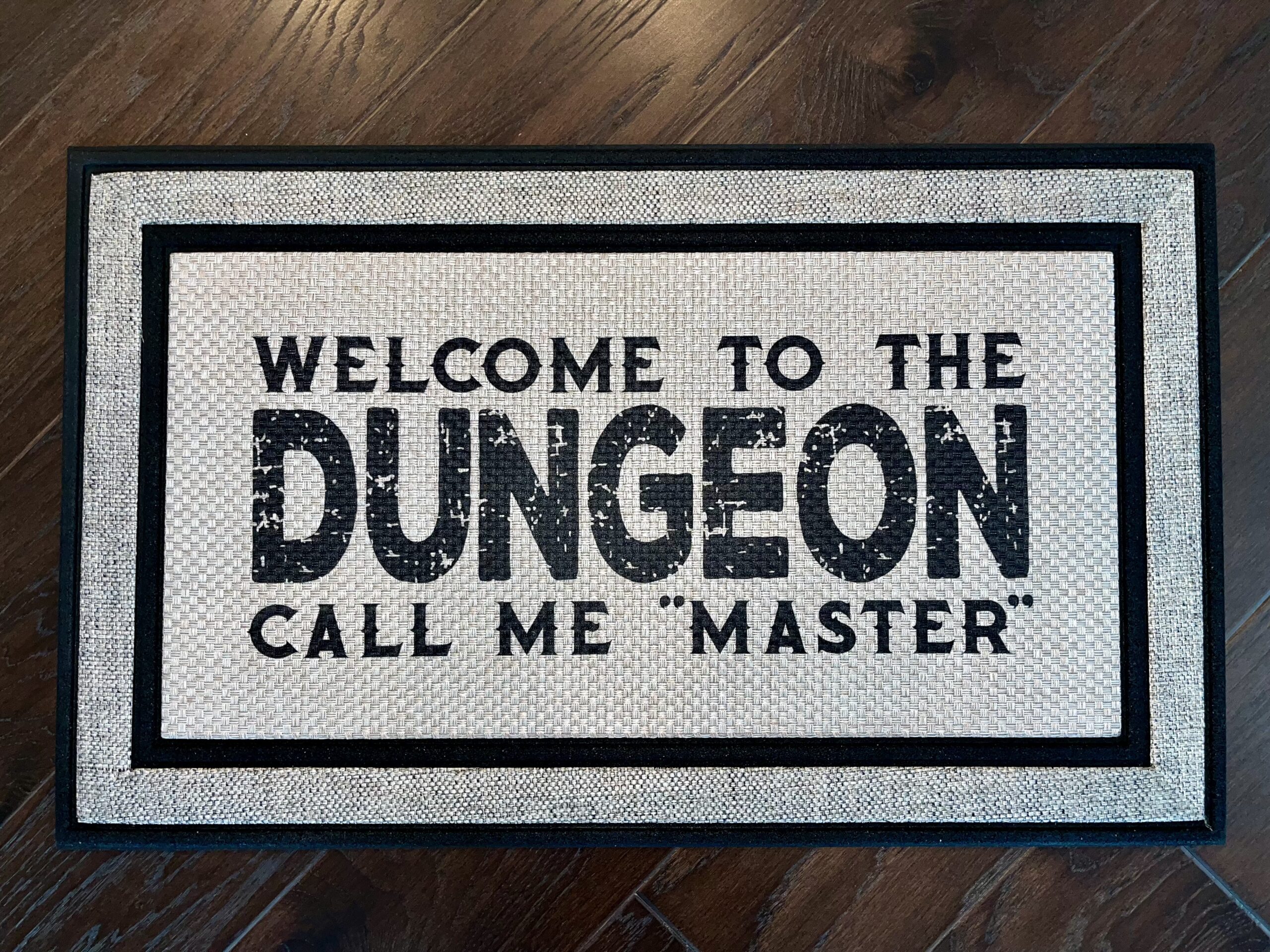 Client picture of a dungeons and dragons inspired doormat that says Welcome to the Dungeon Call me Master